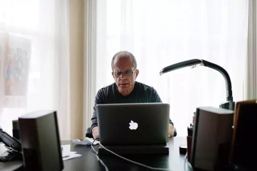 Dennis McNally at his desk